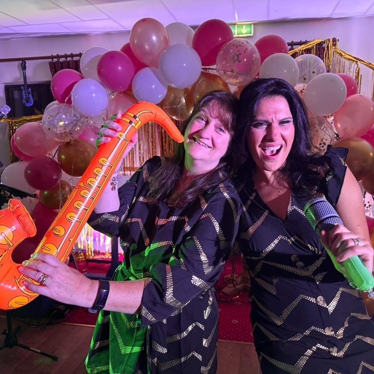 The Rhythm Sisters form the Aliki Sings Entertainment having a bit of fun at break time at Marsh Farm Hotel